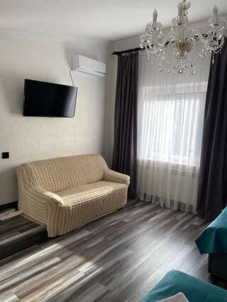 Отель Ideal Hotel Винница Четырехместный номер с душем-5